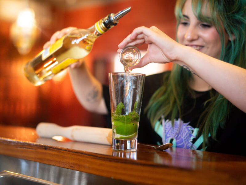 Shaking a cocktail at a bar